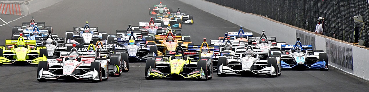 indy cars racing to through the start line Colorado Springs